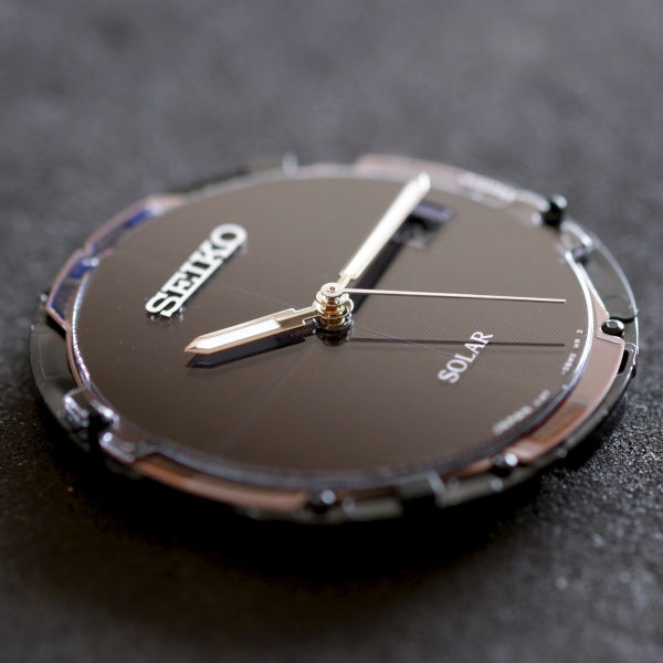 Photo of the Seiko V147 solar movement showing how the dial is a solar panel.